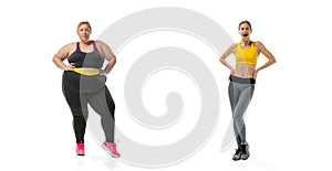 Young slim girl and plus-size woman wearing sport uniform isolated on white background. Concept of healthy lifestyle