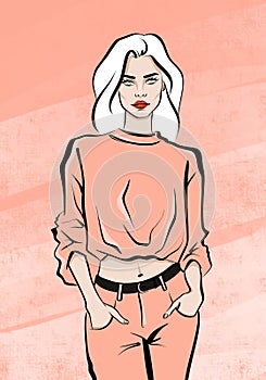 Young slim woman with white bleached hair in peach colored sweatshirt and trousers.