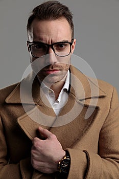 Young smartcasual model wearing glasses