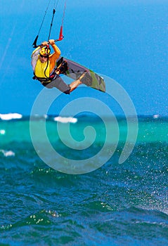 Young smiing kitesurfer on sea background Extreme Sport Kitesur