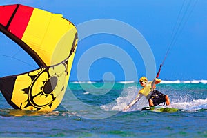 Young smiing kitesurfer on sea background Extreme Sport Kitesur