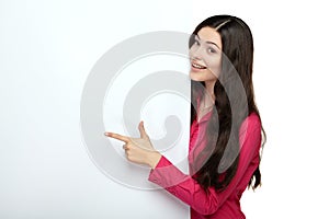 Young smile woman pointing at a blank board