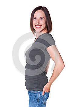 Young smiley female standing over white