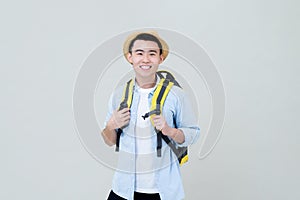 Young smiling Asia tourist man backpacker