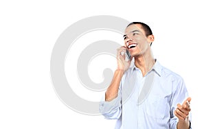 Young smiling black businessman talking on cell phone