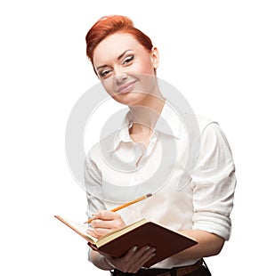 Young smiling business woman holding diary