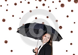 Young smiling businesswoman under umbrella among coronavirus cells.