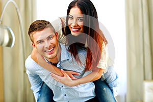 Young smiling couple having fun