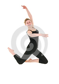 Young smiling dancer female in black leotard
