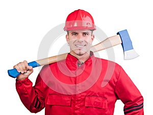Young smiling fireman with hard hat and ax