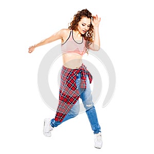 Young fitness girl dancing zumba isolated on white