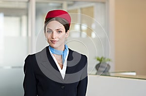 Young smiling flight assistant