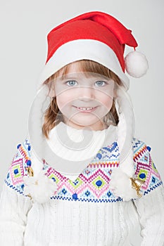 Young smiling girl with Christmas cup