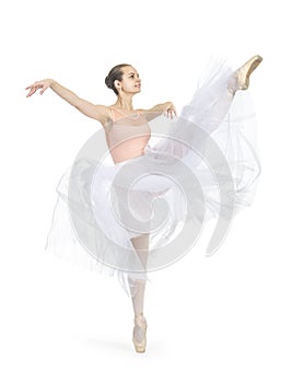Young smiling girl is dancing ballet.