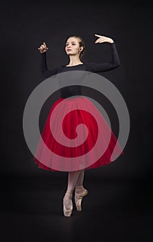 Young,smiling girl dancing the ballet.