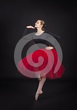 Young,smiling girl dancing the ballet.