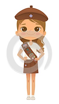 Young smiling girl scout wearing sash