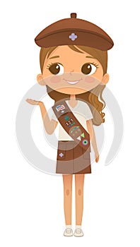 Young smiling girl scout wearing sash