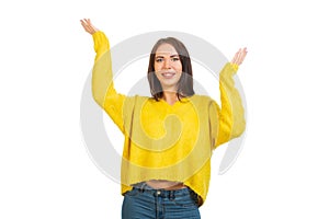 Young smiling girl in a yellow sweater, Isolated on a white