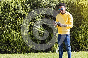 Young smiling man counting money