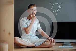 Young smiling man has an idea.Idea concept