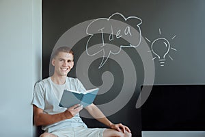 Young smiling man has an idea.Idea concept