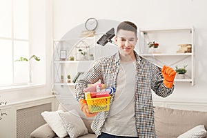 Young smiling man ready to clean home