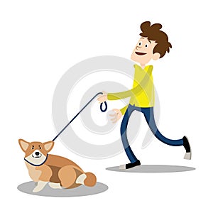 Young smiling man walking with the dog