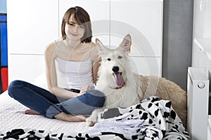 Young smiling woman with dog