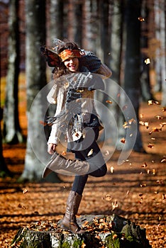 Young smiling woman outdoor in autumn