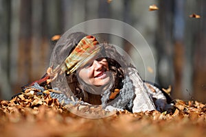 Young smiling woman outdoor in autumn