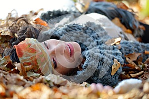 Young smiling woman outdoor in autumn