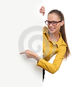 Young smiling woman showing blank card