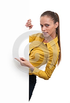 Young smiling woman showing blank card