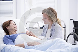 Woman visiting mum in hospital