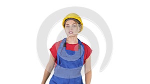 Young smiling worker woman talking and showing objects to her sides on white background.