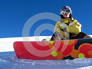 Young snowboard girl