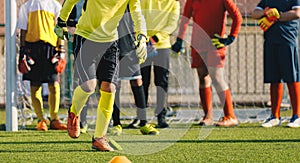 Young Soccer Goalkeepers at Training Unit. Boy Soccer Players Improving Speed Skills