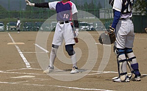 Young softball player in the batter's box