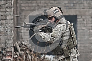 Young soldier on patrol photo