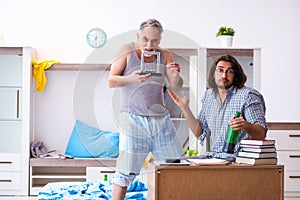 Young son student and dad alcoholic