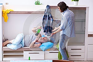 Young son student and dad alcoholic