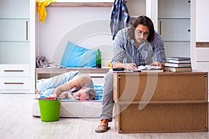 Young son student and dad alcoholic