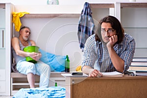 Young son student and dad alcoholic