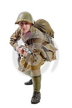 Young Soviet soldier with rifle on the white background