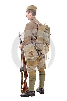 Young Soviet soldier with rifle on the white background