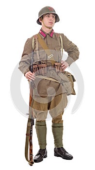 Young Soviet soldier with rifle on the white background