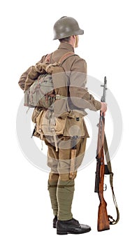 Young Soviet soldier with rifle on the white background