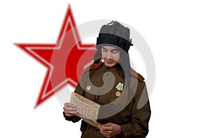 Young Soviet tanker look at a map