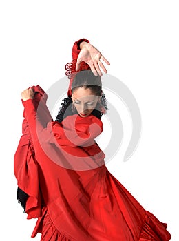 Young Spanish woman dancing flamenco in typical folk red dress photo